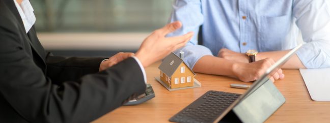 Insurance agent recommends insurance policy.