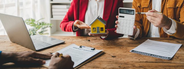Real estate agent delivering sample homes to customers.